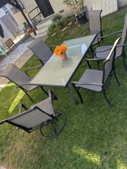 7 Piece Outdoor Patio Set With Glass Table And 6 Chairs, 2 that Swivel
