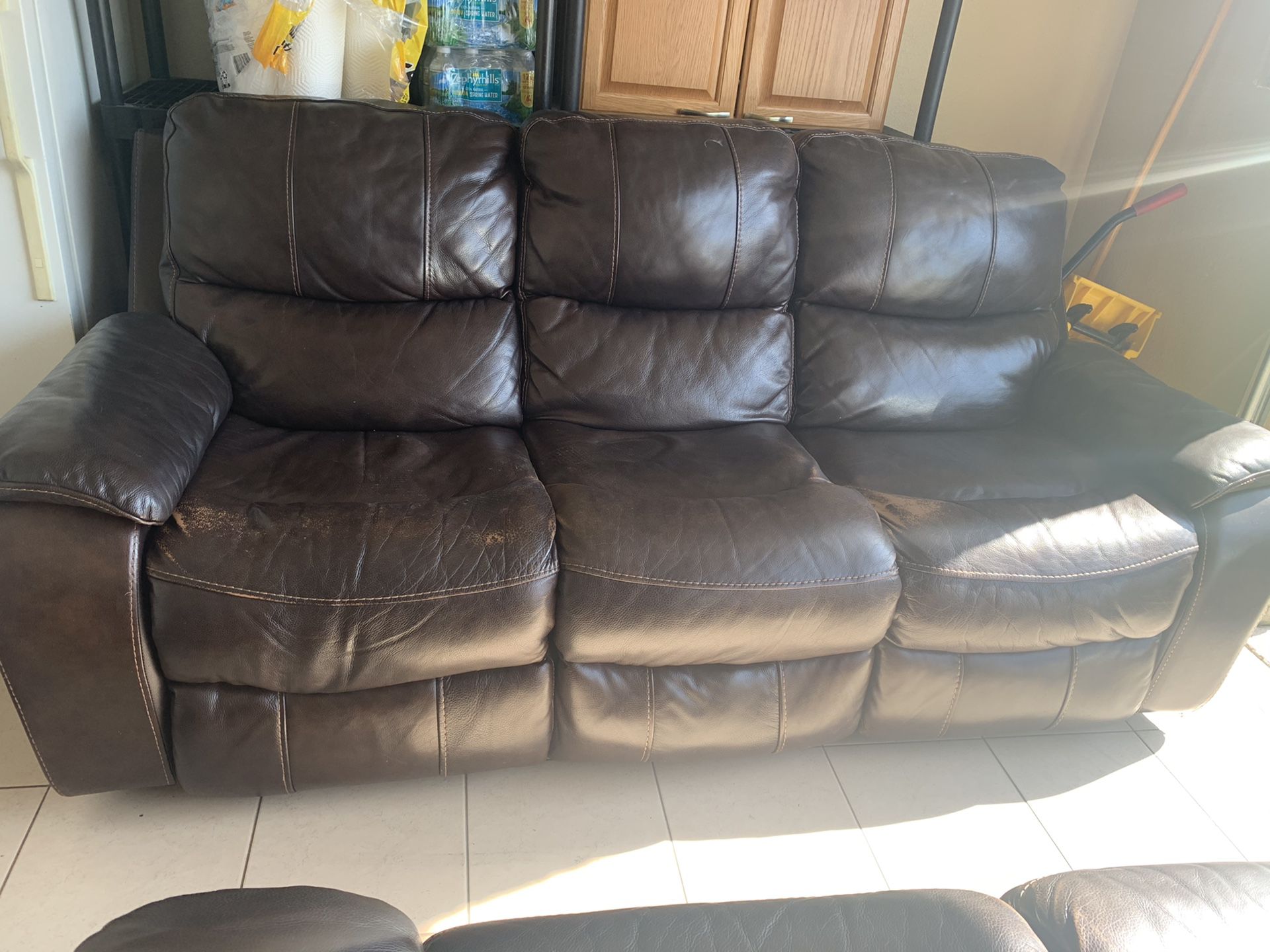 Leather brown sofa and loveseat