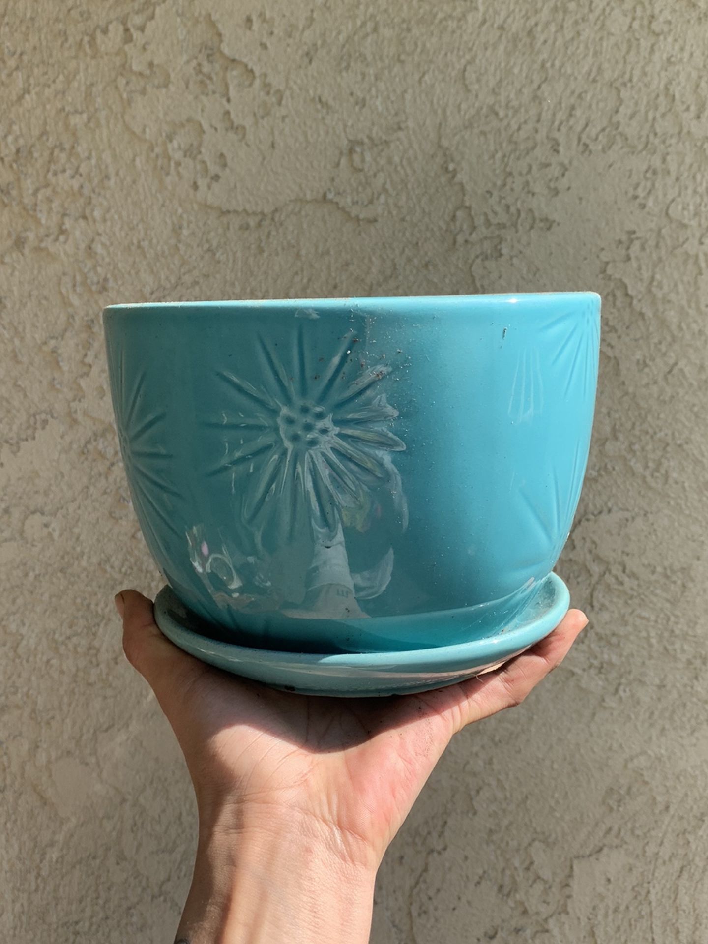 Blue flower pot with design