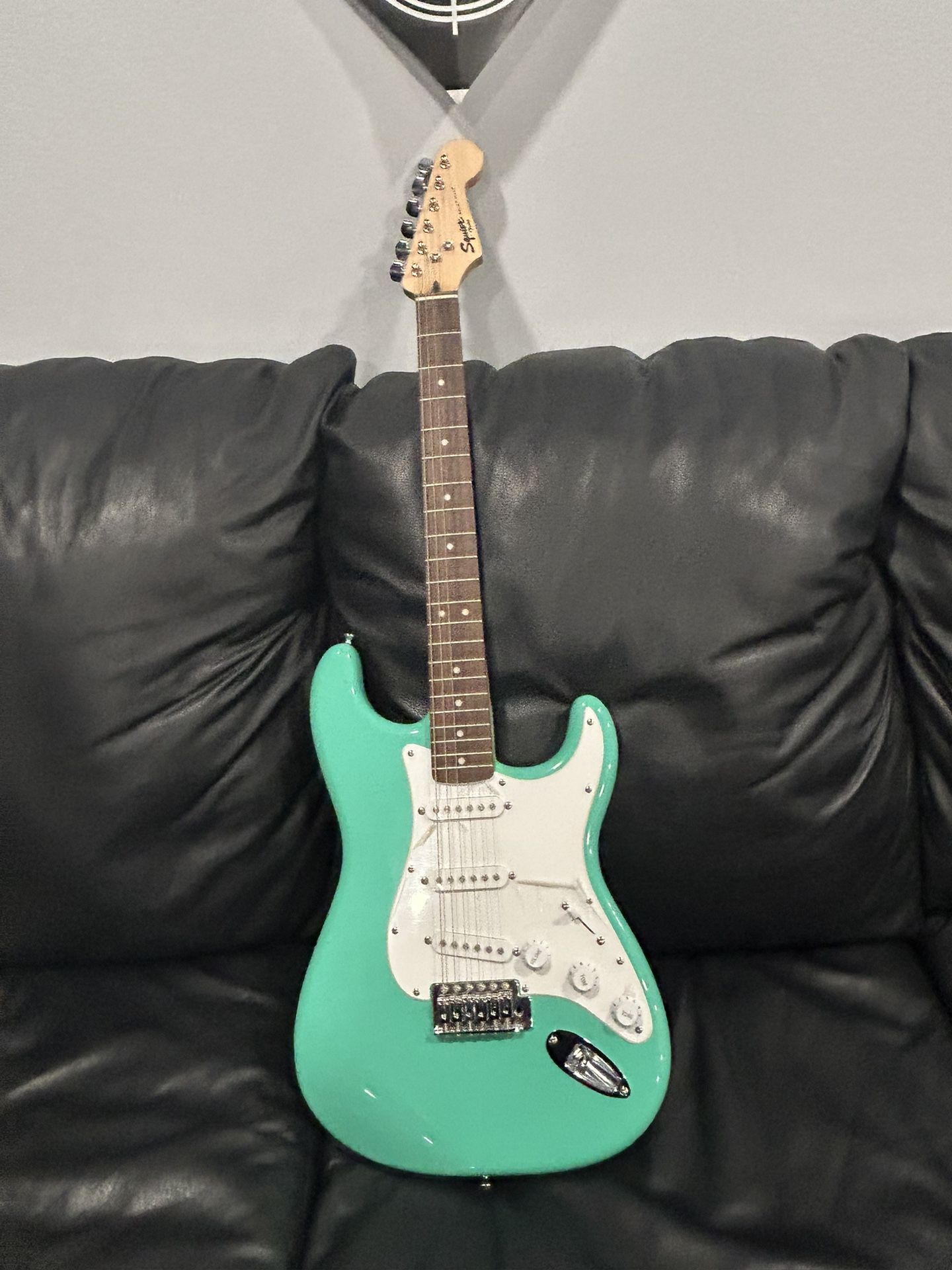 Squier Bullet® Stratocaster HT, Laurel Fingerboard, Tropical Turquoise With Strap And Tuner And Case And Amplifier Wire ( Not Shown )