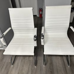 Two White Vinyl And Chrome Metal Chairs