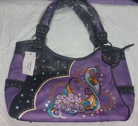 Purple purse with peacock