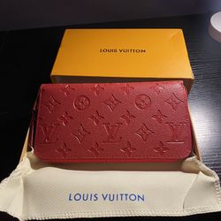 Red leather Louis Vuitton Monogram zip-around wallet