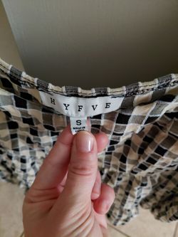 Black and white checkered blouse by RIVE.