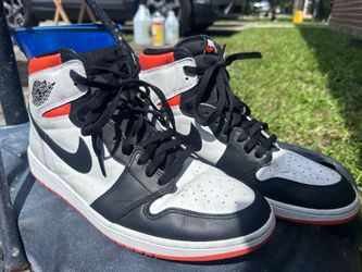 Air Jordan 1 Retro High OG Hyper Crimson' sneakers from 2019.