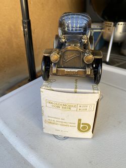 1906 Oldsmobile mobile coin bank brand new