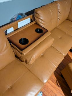 Nice leather sectional with ottoman