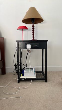 Bed table with outlets