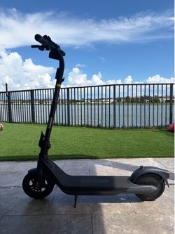 Electric Scooter, 15.5–20 MPH, Long Range, Dual Elastomer Suspension