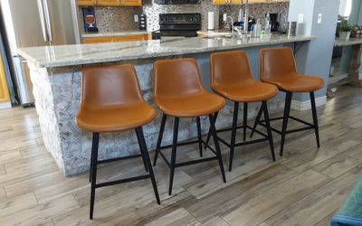 Four counter height bar stools