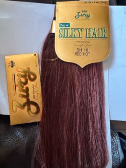 Silky Hair SH 10 Red Hot human hair weft. Smooth, silky texture for easy styling. Vibrant red shade for bold color. Designed for comfortable blending 