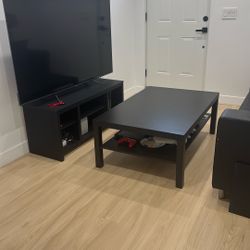Table, TV Stand And Sofa
