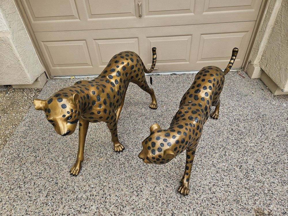 pair of Bronze cheetahs