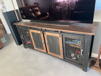 Industrial style wood and metal media cabinet