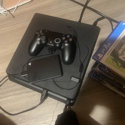 PS4 slim w. 2TB hard drive and 8 games