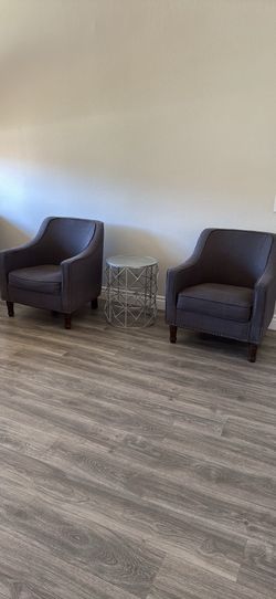 Gray accent chairs and table