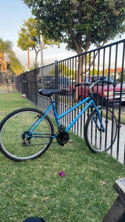A bike the color is blue. It is medium size the brand is magna. The model is glacier point.