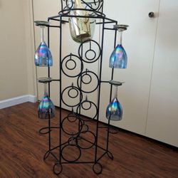 Black scroll wrought iron wine and glasses rack with glass ice bucket