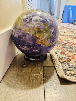 Brand New World Puzzle On A Stand