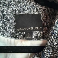 Grey and black tweed blazer with faux leather trim and zipper detail