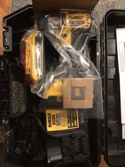 Dewalt Brushless 3 speed impact driver ( BRAND NEW ). Comes with 2 batteries & charger & carrying case.