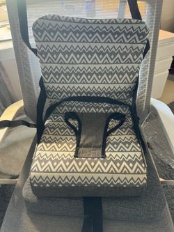 Almost brand new height chair to go lightweight that works great asking 20
