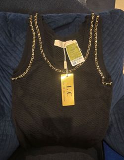 Brand new sleeveless black and gold shirt