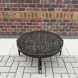 Signature Design by Ashley Jillenhurt Industrial Round Coffee Table – $275 (Lightly Used)