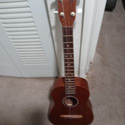 Baritone Ukule. With Case
