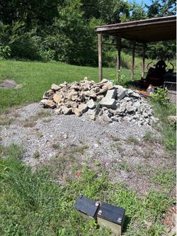 Backfill, retaining wall, concrete scrap, and pebbles backfill, concrete scrap concrete, scrap pebbles pebbles