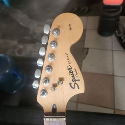 Large Headstock Squier.