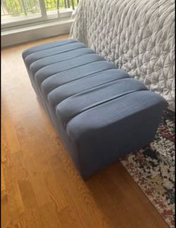 Like new upholstered storage ottoman.