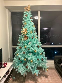 9 ft tall Christmas tree (ornaments not included)