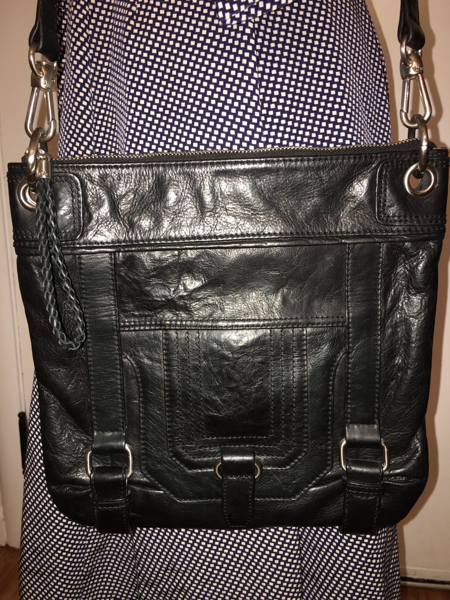 Black leather crossbody bag by The Sak