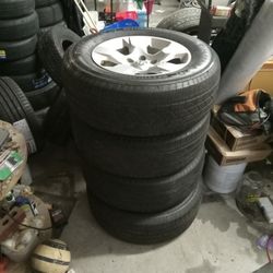 Set Of 275/65/18 FIRESTONE DESTINATION LE3 W/STOCK RAM 1500 RIMS WHICH ARE EXTRA CLEAN CONDITION