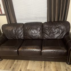 Ashley’s Brown Leather 3 Seated Couch 