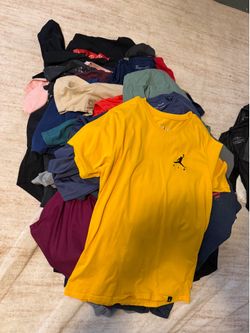 35 name brand shirts