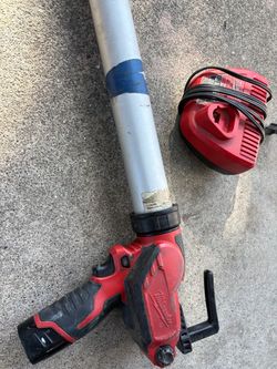 Milwaukee  caulking gun with Charger
