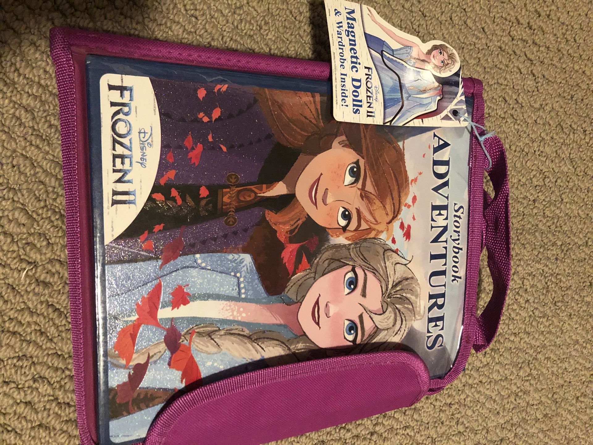 Frozen 2 story book with magnetic dolls