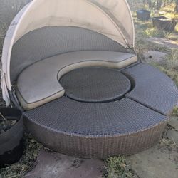 Four-Piece Rattan Daybed Set Missing A Couple Of Cushions