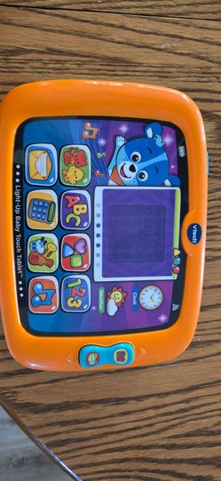 V Tech baby touch screen tablet.