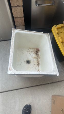 Large cast iron laundry sink