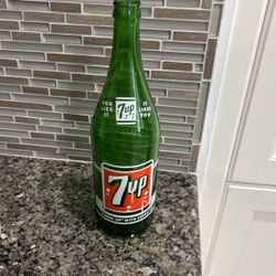 Antique 7-Up Soda Bottles