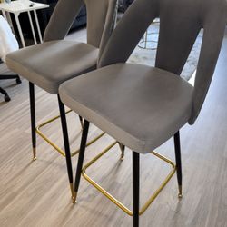 2 Gray Velvet Bar Stools with Gold Accents 