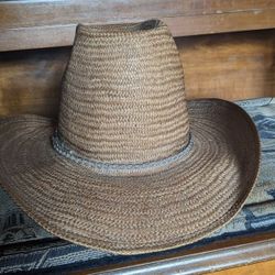 For Sale, Really Neat Brown Straw Hat With Metal Silver Band, . Size 7 $45