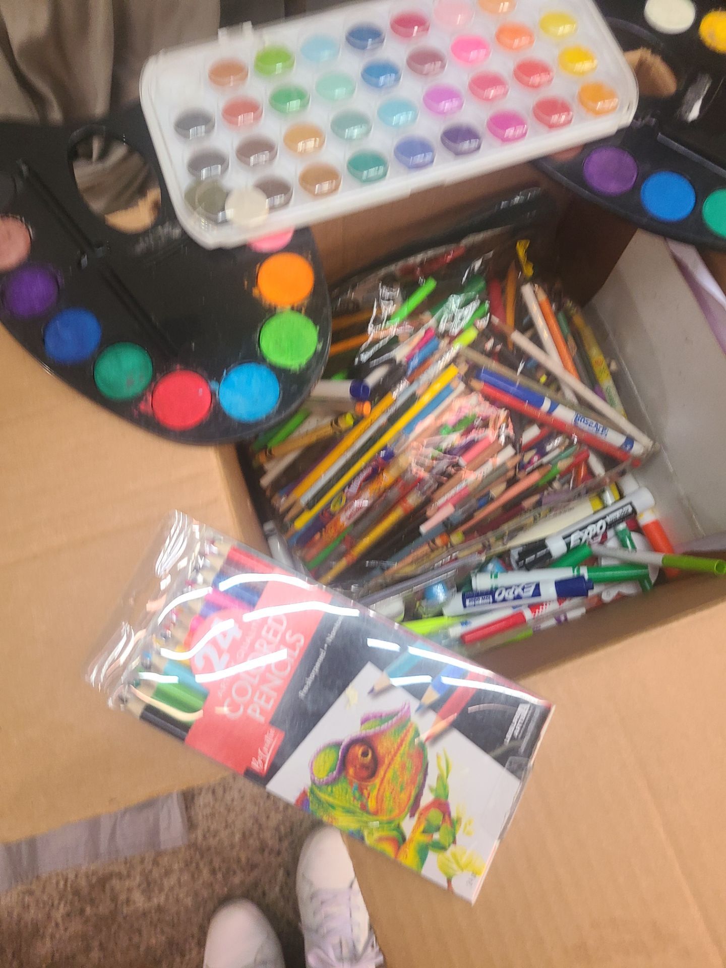 Box of art supplies