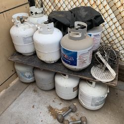 A Lot Of Empty Propane BBQ Grill Asador tanks
