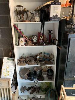 Shoes, clothes, antiques, records lamps sofa