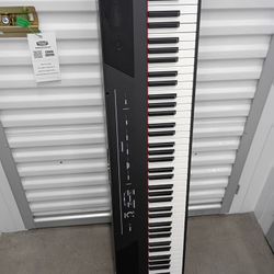 Alesis Recital Pro - 88 Key Digital Piano Keyboard with Hammer Action Weighted Keys, 2x20W Speakers, 12 Voices, Record and Lesson Mode, FX and Display