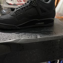 Black Cat Jordan 4s 